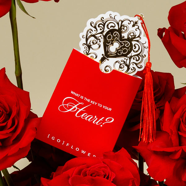 Red Milano Roses in Signature Vase Wrap